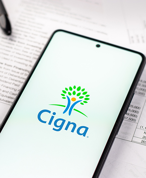 Phone screen showing the logo for Cigna dental insurance