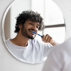 Man brushing his teeth