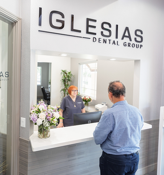 Man checking in at Iglesias Dental Group
