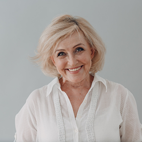 Smiling older blonde woman