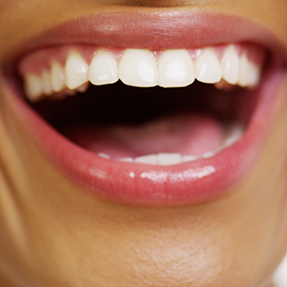 Close up of a person grinning