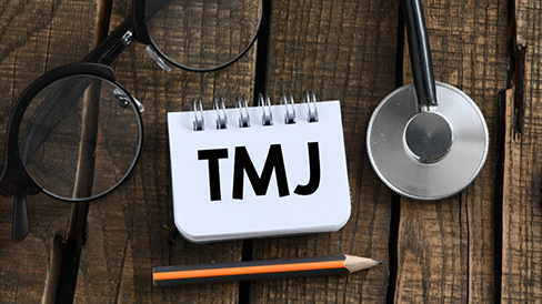 Notepad that says TMJ