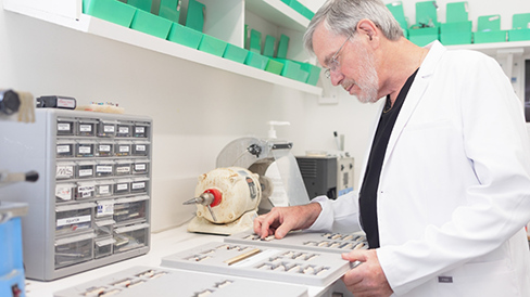 Doctor Kulick working in a dental lab